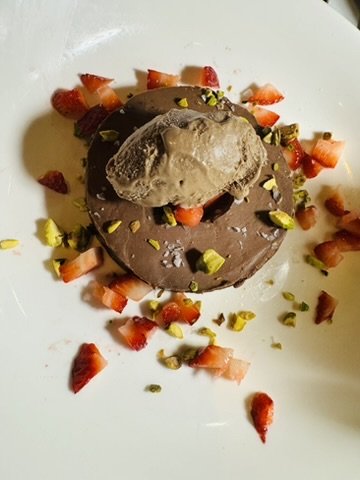 Chocolate semifreddo with strawberries and crushed pistachio